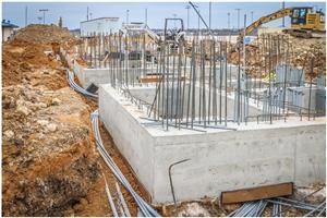 Plumbing and electrical rough-in is in progress for the main pressbox at Boswell High School 