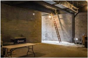 CMU walls, rough-in plumbing, and duct work are 70% complete in the Varsity and JV locker rooms and shower area at Boswell HS 